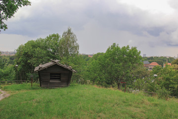 Stockholm's old wooden townhouse and its beautiful garden with flowers.