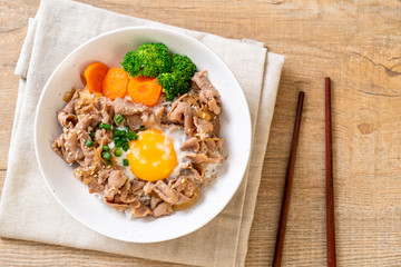 donburi, pork rice bowl with onsen egg and vegetable