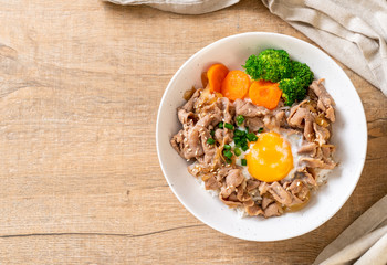 donburi, pork rice bowl with onsen egg and vegetable