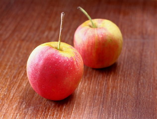 Fresh Juicy red apples on old wooden
