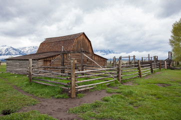 Fototapeta na wymiar Log Cabin Barn in front of Mountains in the Grand Teton National Park