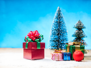 beautiful gift box on snow  floor, christmas background concept