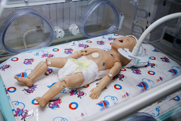Simulator of a newborn baby in a cuvette