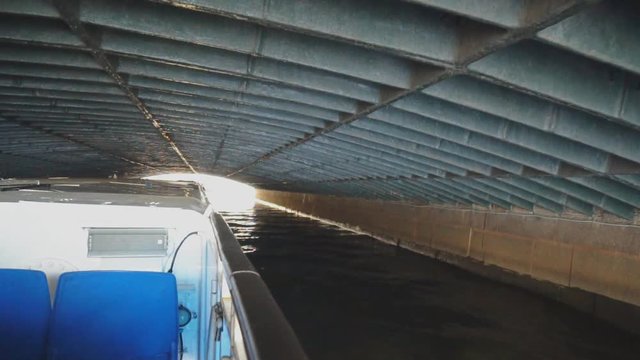 Under the longest bridge of the river Moyka in St. Petersburg. Blue bridge.