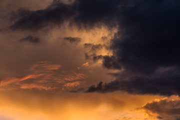 Fototapeta premium Amazing colored sky at sunset, artistic and mystical sky background, art in sky, warm orange sky, natural abstract art , fire in the sky