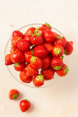 Fresh strawberries on a glas plate, plateau. Isolated. 