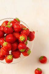 Fresh strawberries on a glas plate, plateau. Isolated. 