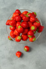 Fresh strawberries on a glas plate, plateau. Isolated.
