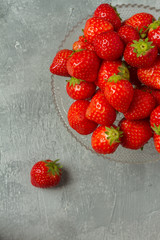 Fresh strawberries on a glas plate, plateau. Isolated.