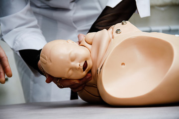 Simulator of childbirth gives birth to a child