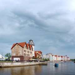 Fototapeta na wymiar Center of the Kaliningrad city in Russia with a river Pregolya and renovated buildings