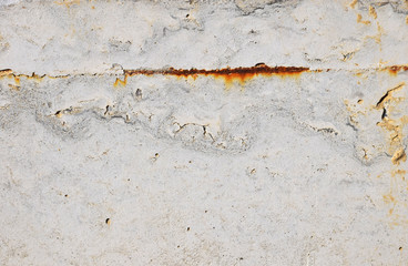 Grunge uneven concrete background texture with rust