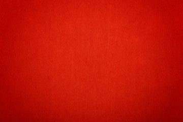 Scarlet red felt background texture close up