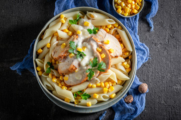 Yummy penne with chicken, corn and bechamel sauce