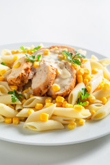 Yummy pasta with chicken, corn and bechamel sauce