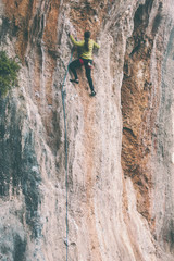 A rock climber on a rock.