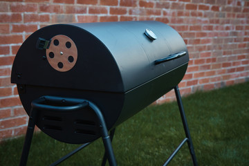 Black barrel grill.