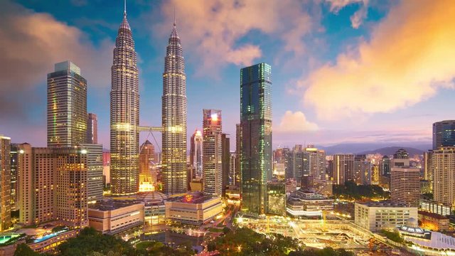 Beautiful Kuala Lumpur city skyline with dramatic sky , twilight scene . Malaysia .