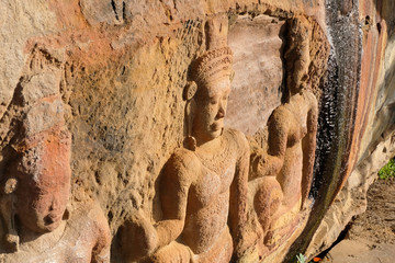 Stone carved Buddha face on ancient
