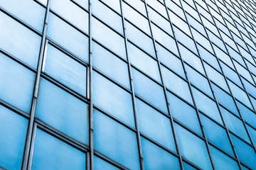 Blue glass facade windows of skyscraper
