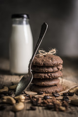 freshly baked chocolate chip cookies on rustic wooden table