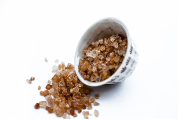 Gond katira or edible gum or common gum in a bowl isolated on white.