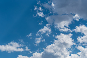 Naklejka na ściany i meble Blue sky with white clouds background