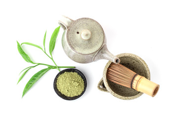 Matcha is a powder of green tea leaves packed with antioxidants on white background.