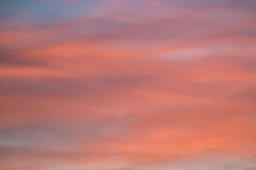 Dramatic sunset and sunrise sky with pink clouds