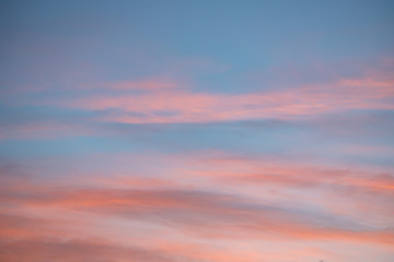 Naklejka na ściany i meble Dramatic sunset and sunrise sky with pink clouds