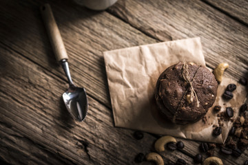 freshly baked chocolate chip cookies on rustic wooden table
