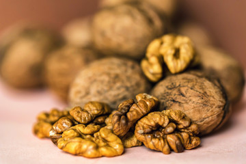 Walnuts and kernels on beige backgound