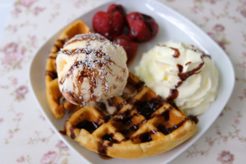 Fototapeta na wymiar Fresh waffles with ice cream