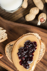 Homemade Healthy Breakfast. Peanut Butter and Jelly on Dark Wooden Background.