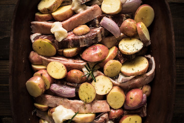 Lamb Loin Chops and Vegetables Prepared for Roasting. Copy Space.