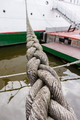 Fototapeta premium Rope at the museum of the World Ocean in Kaliningrad city in Russia in cloudy weather