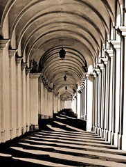 architectural arcades on the uphill road leading at the Basilica dedicated with sepia toned effect...