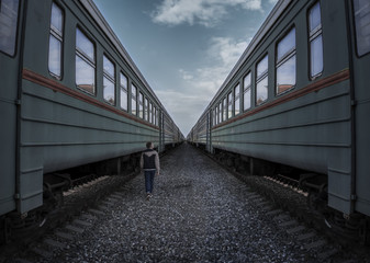 Man between trains