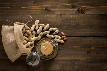 Peanut Butter and Jelly on Wooden Background. Good Morning Healthy Breakfast.