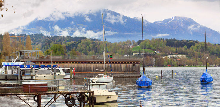 Panoramic view of the lake Lucerne on a cloudy spring day. Town of Luzern, Switzerland.