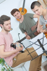 music band performing in a recording studio