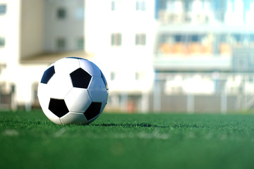 Football on a green field