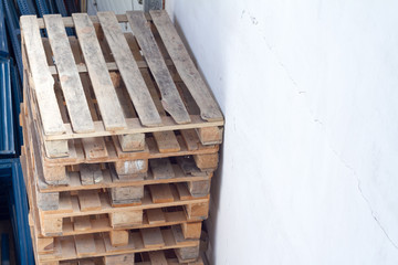 Stacks of Wooden pallets for industrial transportation by truck