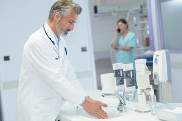 Doctor washing his hands