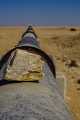 Rock on Namib water pipe