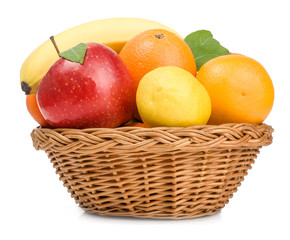 Fruit in basket isolated on white