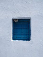 Details of a small blue window in Amorgos