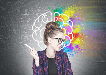 Cheerful young hipster woman, creative brain