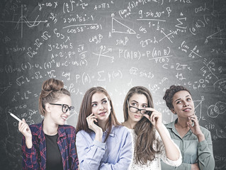 Diverse young women team, science formula