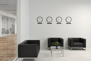 Office wating room with armchairs and clocks